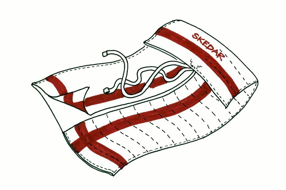 Illustration av en bestickfodral med röd text och dekoration.